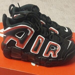 Nike Black and Red Uptempo Sneakers with Iconic Design